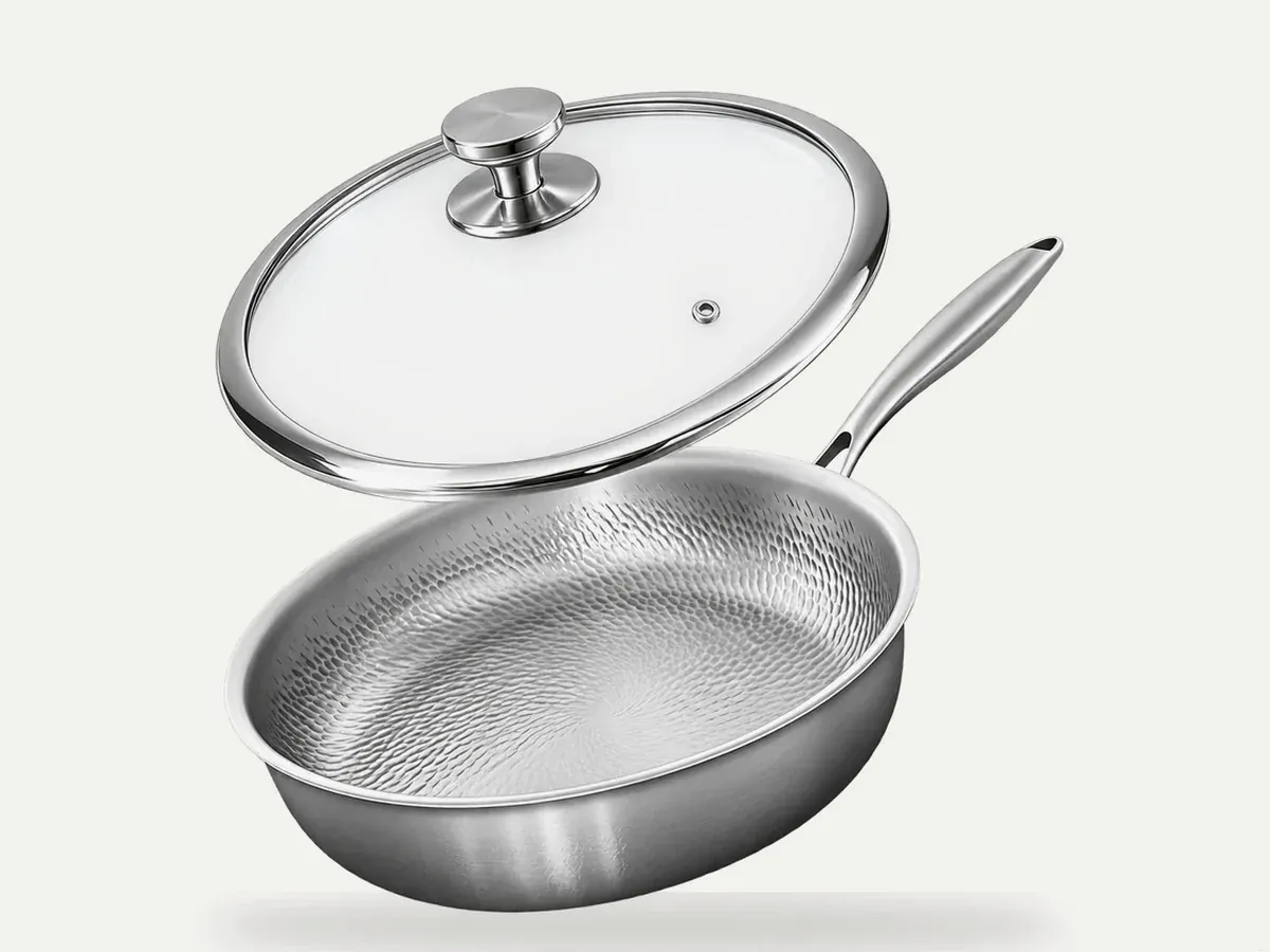 Close-up of the Joyhnny hammered titanium micro-dimple surface